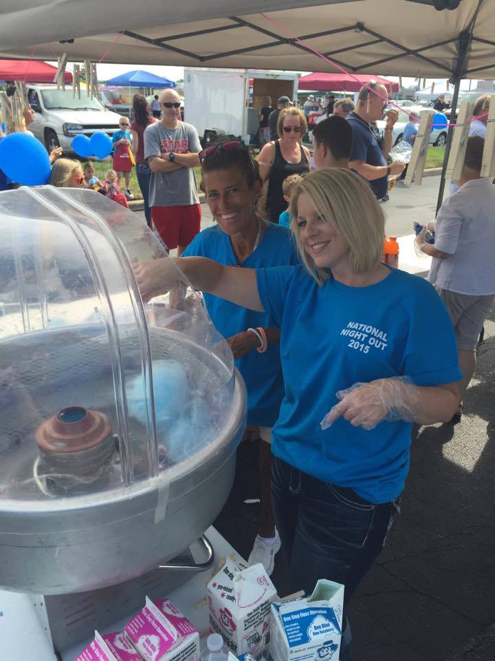 Volunteers Making Cotton Candy at National Night Out